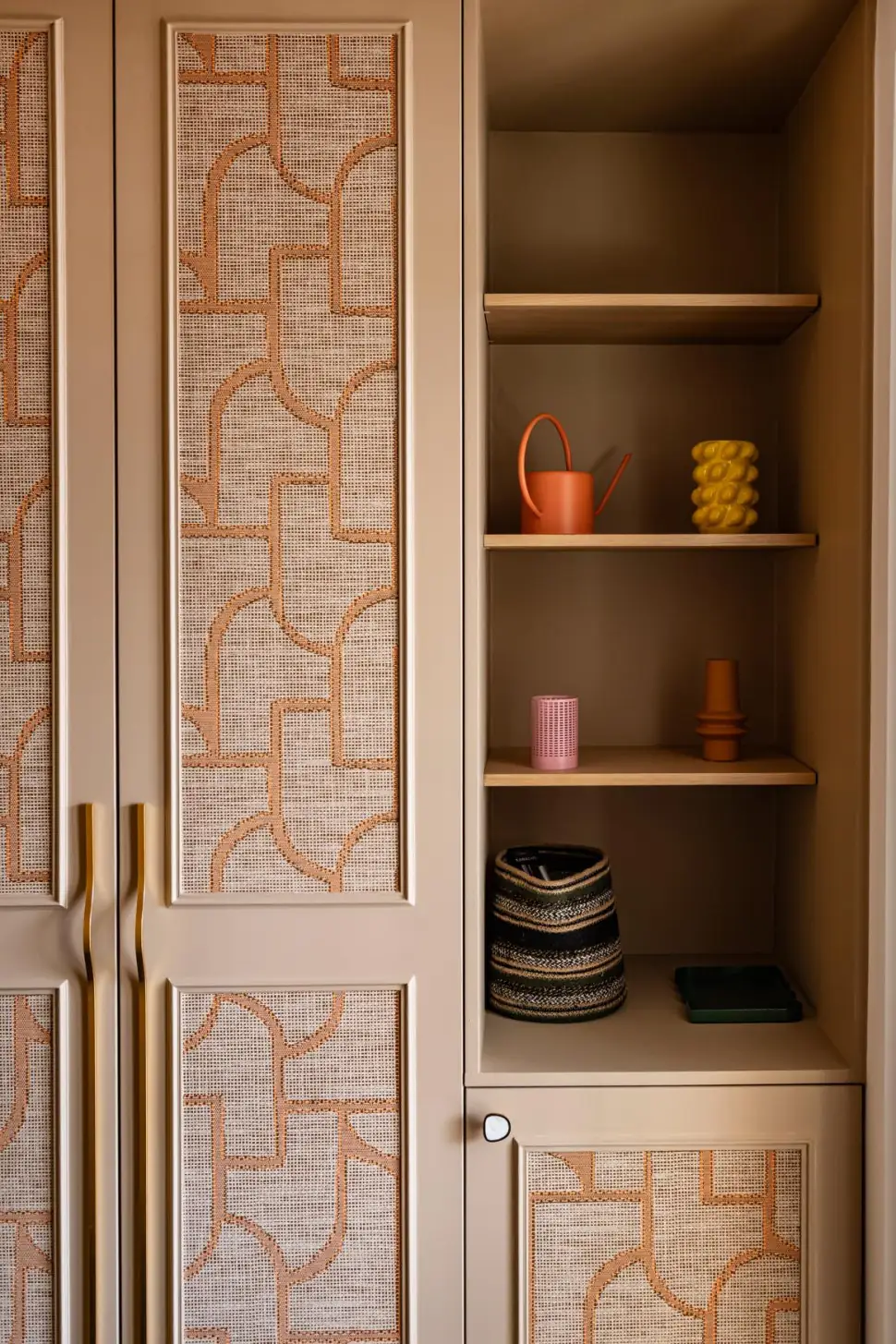 Cabinetry with patterned panel inserts